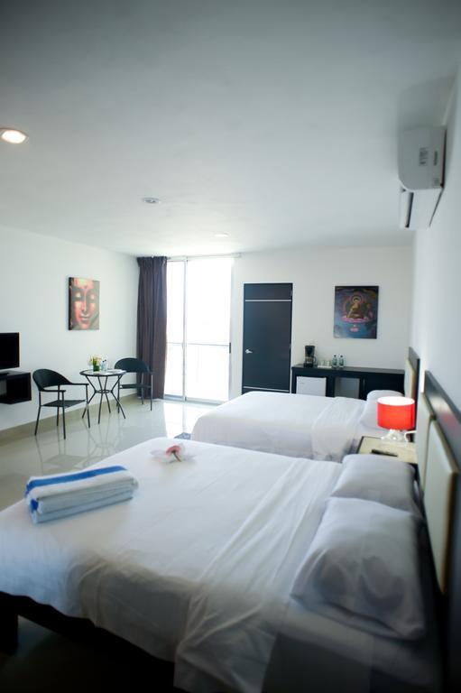 Sunrise 42 Suites Hotel Плая дел Кармен Стая снимка