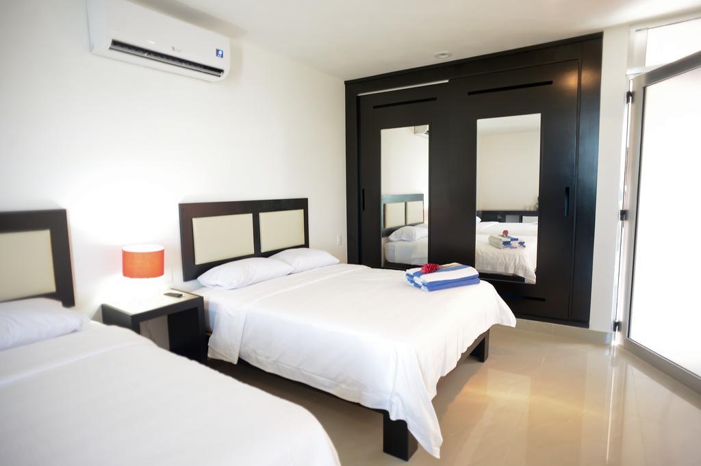 Sunrise 42 Suites Hotel Плая дел Кармен Стая снимка