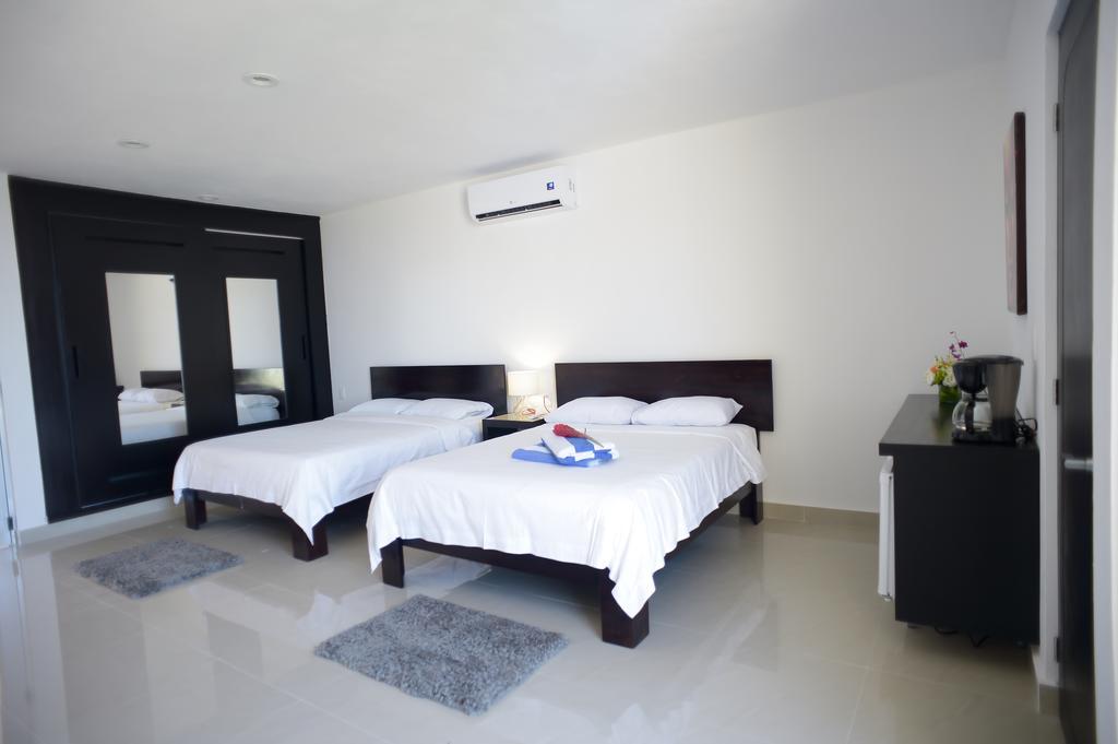 Sunrise 42 Suites Hotel Плая дел Кармен Стая снимка