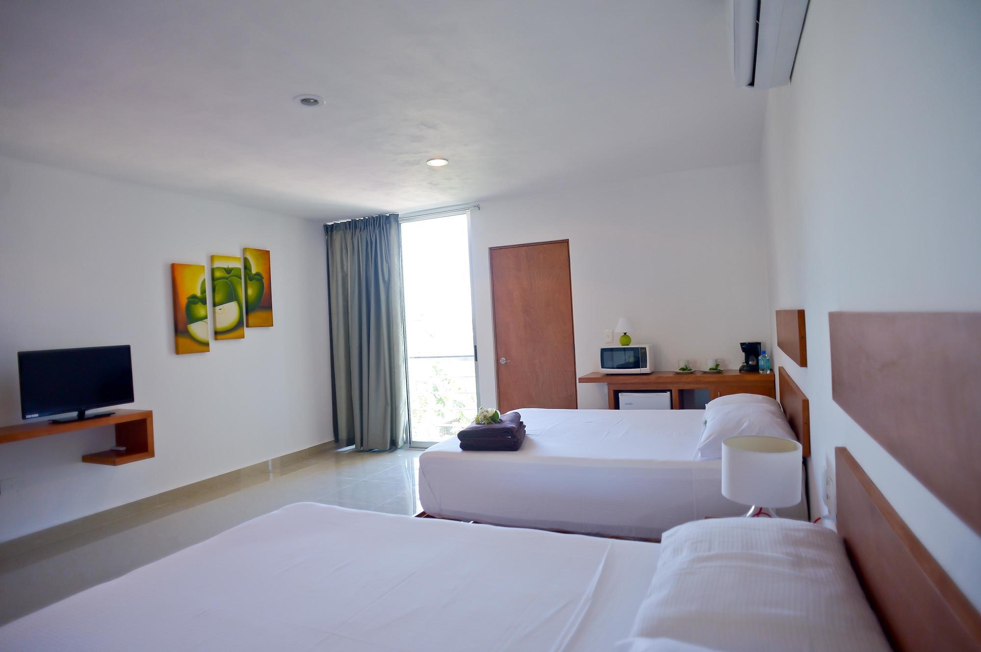 Sunrise 42 Suites Hotel Плая дел Кармен Екстериор снимка