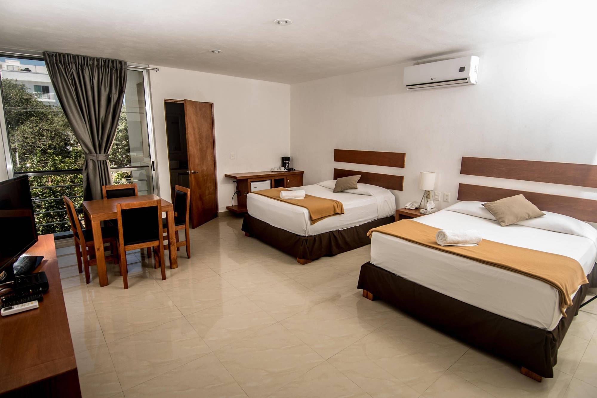 Sunrise 42 Suites Hotel Плая дел Кармен Екстериор снимка
